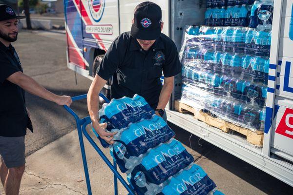 Case packs of water delivered to your convenience store.