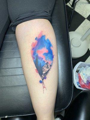 Colorful mountain scenery tattoo