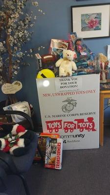 We are a Toys for Tots drop off point.