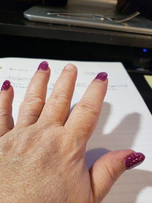 This is my left hand with the middle finger nail off. It just popped off while writing on paper. This index nail was fixed 5/15.