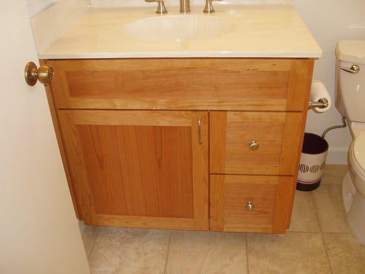 Cherry Bath Vanity with Cultured Marble Top and Porcelain Floor Tiles