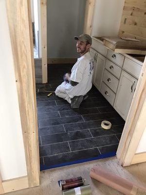 Mike painting master bathroom