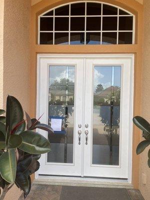 New front entrance doors and custom glass panels,