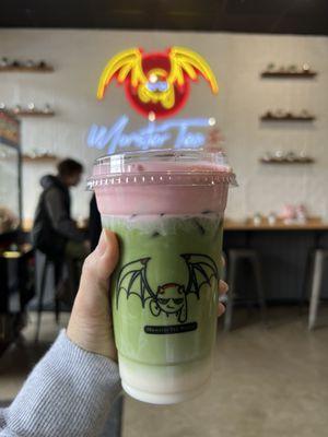 Keroppi: matcha milk tea with pink foam