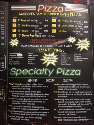 The pizza menu, which does not say you will be charged for light sauce or thick crust.