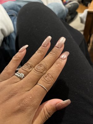 Acrylic on natural nail with gel top polish.