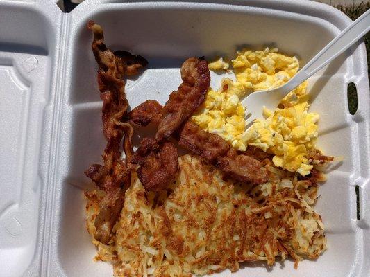 Bacon, eggs and hash browns, takeout.