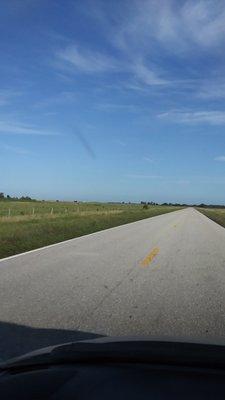 A view out the windshield as we travel across the state of Florida with a passenger on board