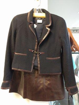 Leather and Tweed Chanel Jacket, size S, for $495 and a Leather Chanel skirt, size S, $395.