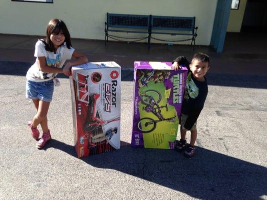 Two happy children that received toys from Dr. Akhbari during Christmas of 2013.