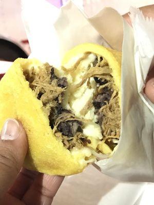 Empanada de Pabellón-  Shredded beef, fried plantain, cheese and black beans!  It's heaven in your MOUTH!!!