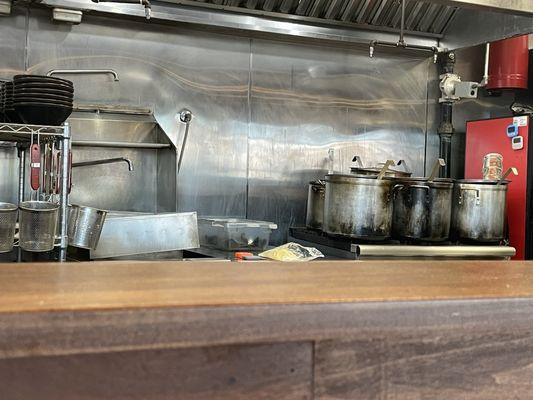 Boiling section with soup bases ready