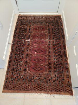 My damaged rug. You can see the holes and the frayed ends.