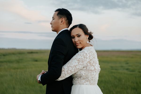 Couple poses for a photo after their elopement in Newburyport, MA