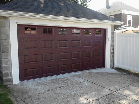 Converted from 2 car garage into double door.