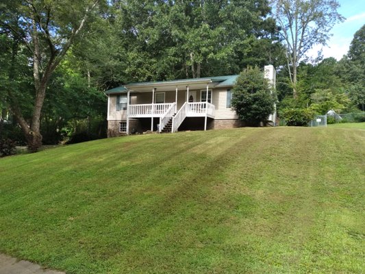 Yard I finished cutting and weed eating Monday.