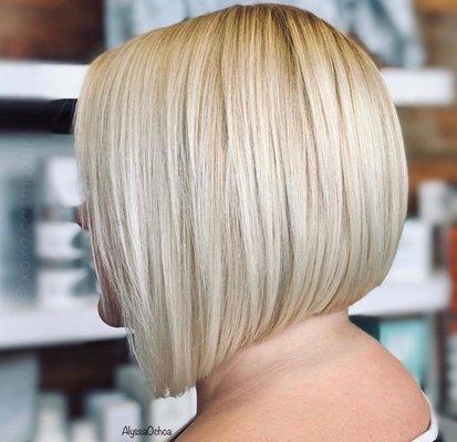 Sassy haircut with bold and dramatic lines.