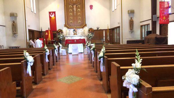 Church pew flowers