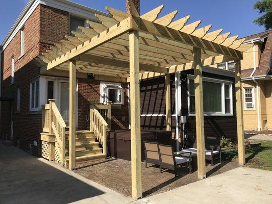 Stamped Concrete Pergola Deck Hot Tub!