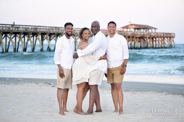 Myrtle Beach Family photographer capturing family portrait on beach