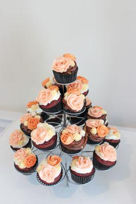 Buttercream flowers available for both cake designs + cupcakes to color coordinate with your wedding theme.