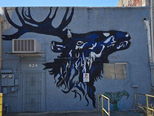 mural along the dumpster alley of Los Mariachis