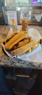 Cheesteak with fried onions and long hots. Fries and a side of ranch