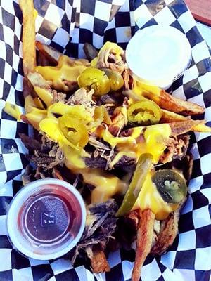 Freaky Fries: hand cut fries, japs, nacho cheese, salsa, sour cream, and beef