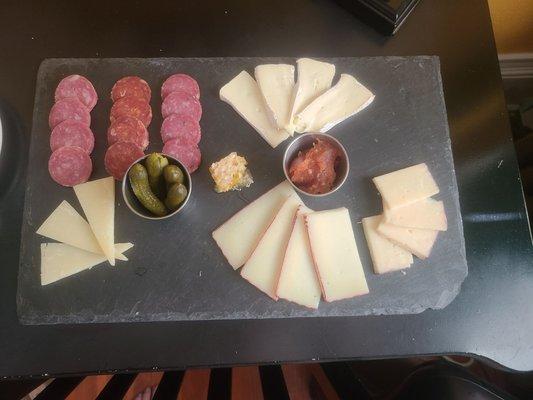 Nicely appointed charcuterie board. Generous slices.