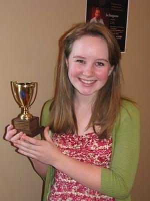 One of our students; a Gold Cup Trophy Winner.  Well deserved for her hard work!