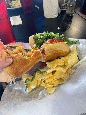 Giant sandwich with chips.