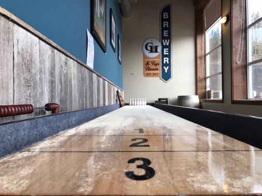 Shuffleboard table with shuffleboard bowling!