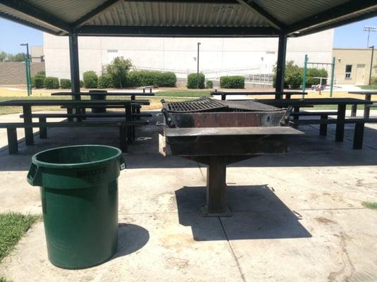 BBQ grill with tables and benches.