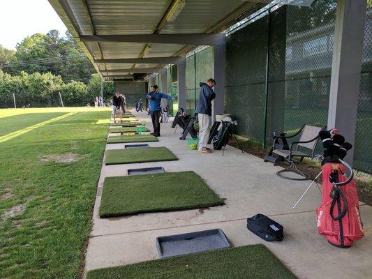 Covered driving range. You hit off mats.