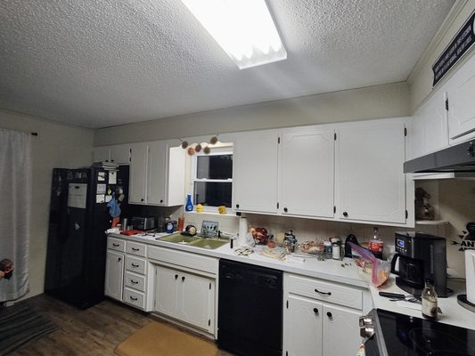 Wooden cabinets and wood paneling after painting