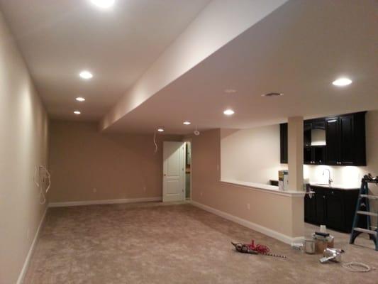 Finished basement with home theater system, full bathroom and a bedroom.