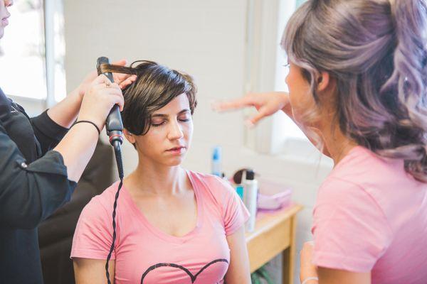 Bridesmaid getting hair done