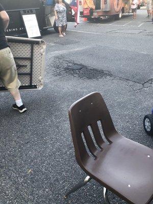 Chairs and tables See broken uneven ground