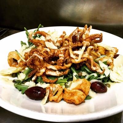 Fried Calamari Salad with Olives, Capers, Shaved Parmesan Cheese, and Creamy Lemon Dressing