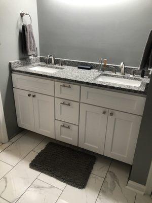 Custom double sink vanity by SP. Very happy with the result!