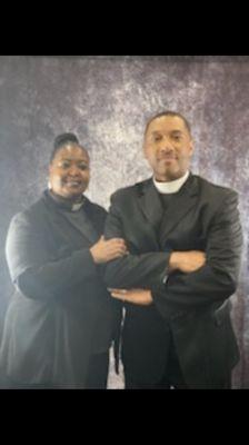 Elder Diane and Pastor Emmanuel in official attire