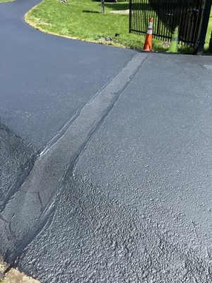 Terrible transition between patchwork and existing driveway