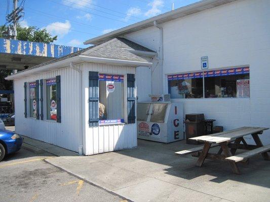 Second entrance. Between the blue shutters and the ice machine.