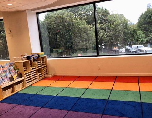 Bright classrooms overlook McCarren Park