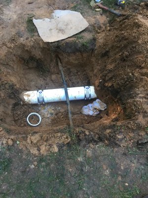 After sprinkler guys trenches through main sewer line