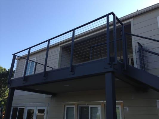 Balcony: custom steel posts with stainless steel cabling