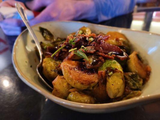 Brussel sprouts... they were soggy. Just soft with char spots. Topped with candied bacon, onions, and balsamic. Disgusting