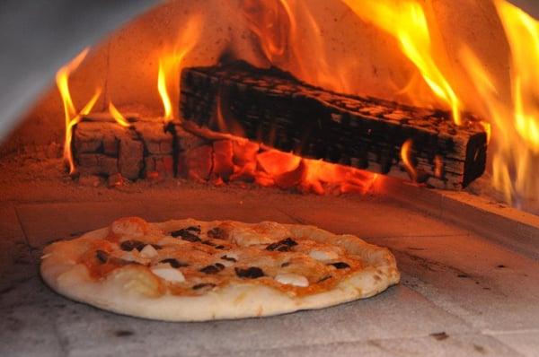 Wood fired pizza in our Bistro