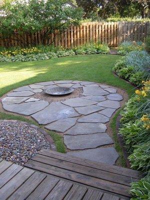 Simple but elegant small flagstone patio and fire pit area