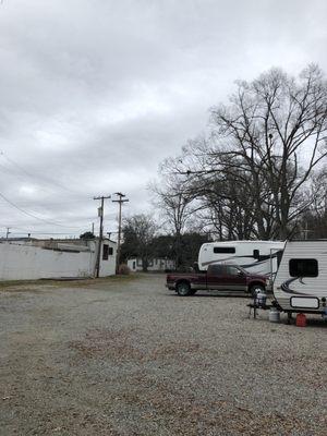 The white building on the left was a barrier to the main (busy) road.